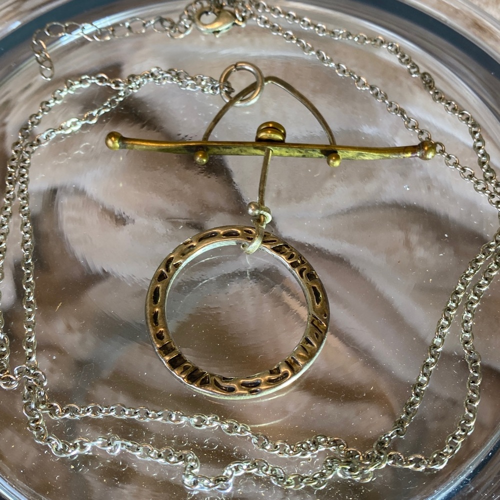 Elegant Silver and Gold Pendant Necklace